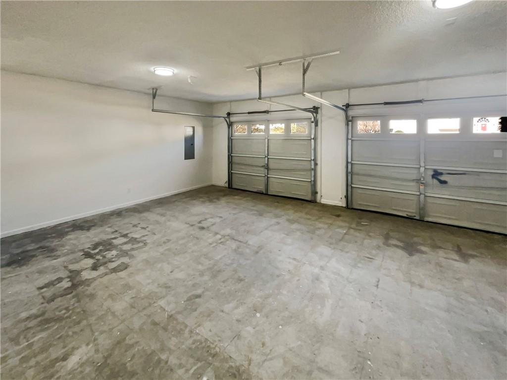 180 Honeysuckle Drive Southeast Calhoun, GA 30701 - Photo 18 of 21 a view of a garage