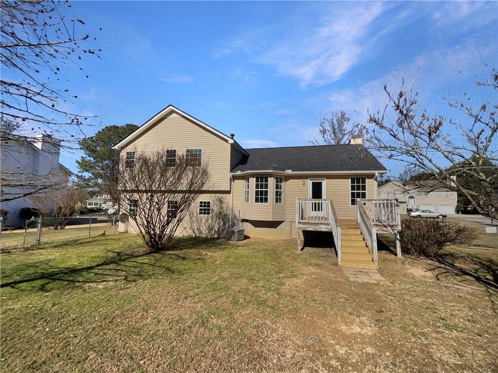 180 Honeysuckle Drive Southeast Calhoun, GA 30701 - Photo 19 of 21 a front view of a house with a yard