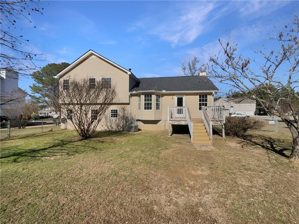 180 Honeysuckle Drive Southeast Calhoun, GA 30701 - Photo 21 of 21 a view of a house with a yard
