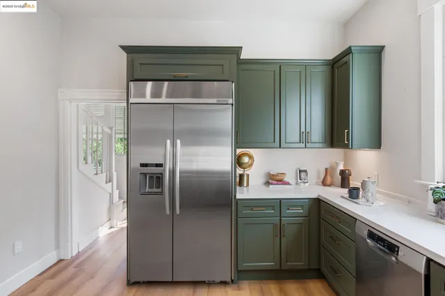 a kitchen with a stove and a sink