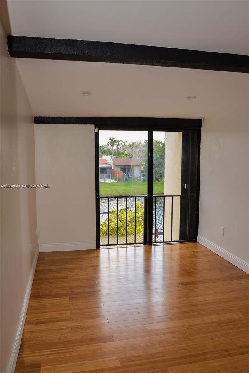7849 Southwest 103rd Place Miami, FL 33173 - Photo 39 of 64 a view of an entryway with wooden floor