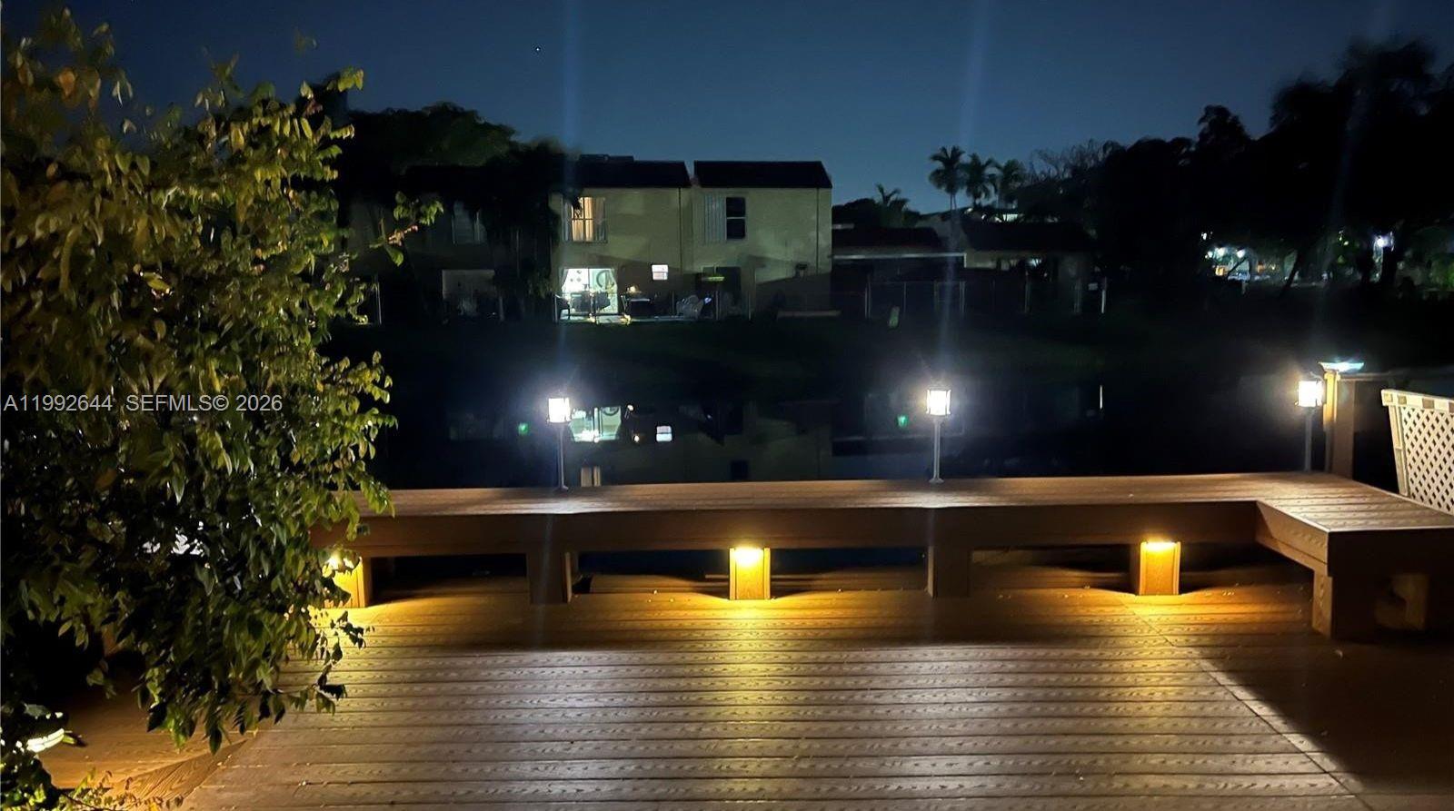 7849 Southwest 103rd Place Miami, FL 33173 - Photo 58 of 64 a view of a swimming pool with an outdoor seating