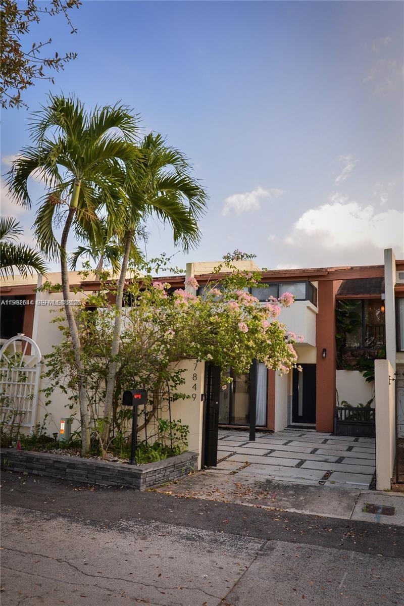 7849 Southwest 103rd Place Miami, FL 33173 - Photo 59 of 64 a view of a house with a patio