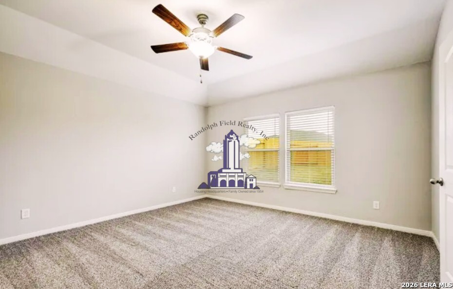 9330 Bennett Forest Converse, TX 78109 - Photo 11 of 20 an empty room with a window and a ceiling fan