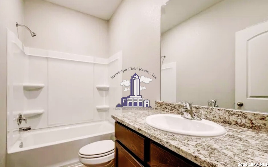 9330 Bennett Forest Converse, TX 78109 - Photo 19 of 20 a bathroom with a granite countertop sink toilet and shower