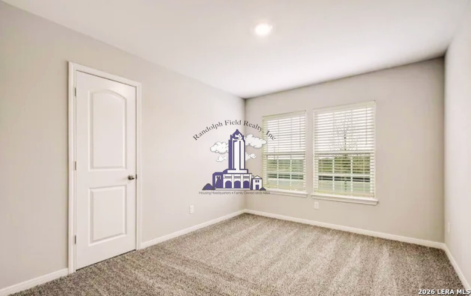 9330 Bennett Forest Converse, TX 78109 - Photo 20 of 20 an empty room with wooden floor and windows