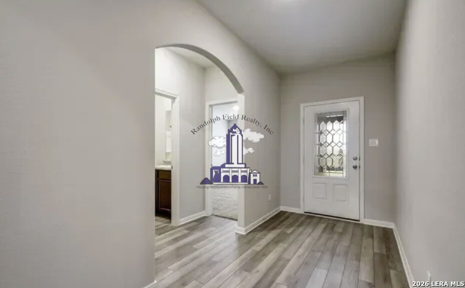 9330 Bennett Forest Converse, TX 78109 - Photo 2 of 20 a view of an entryway with wooden floor