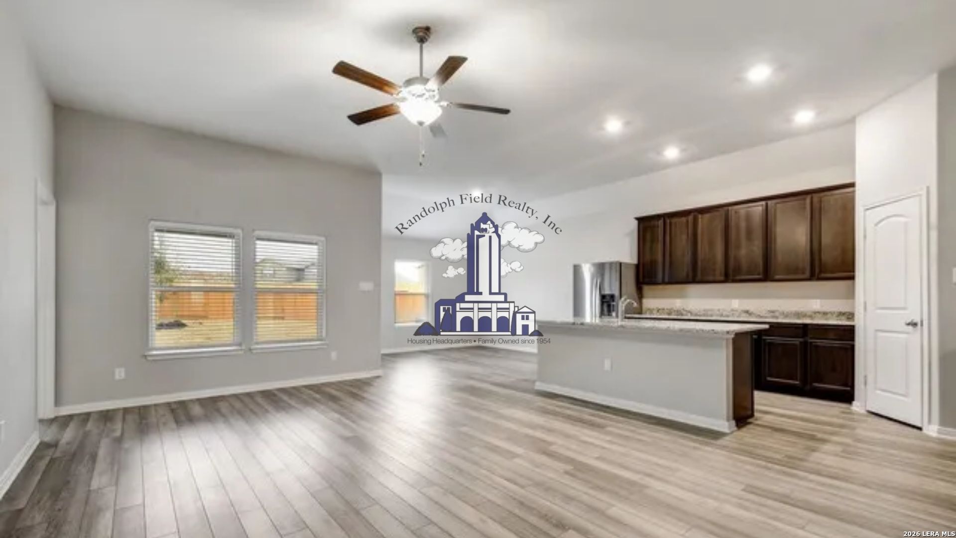 9330 Bennett Forest Converse, TX 78109 - Photo 4 of 20 a view of a kitchen with microwave and stove