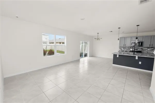 a view of a kitchen with a sink