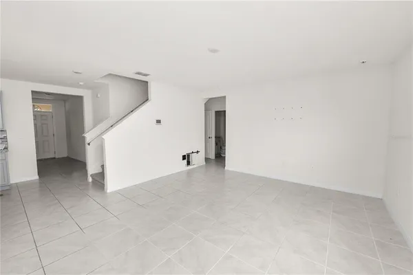 a bathroom with a granite countertop sink a toilet and a bathtub
