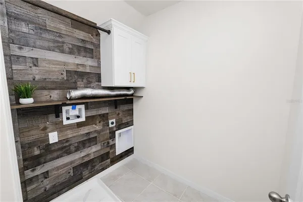 a view of a backyard of the house