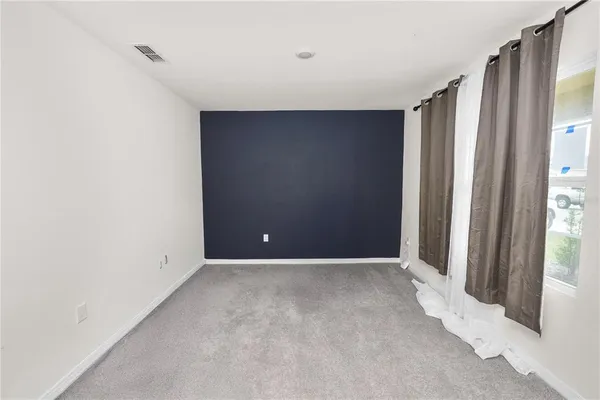 a kitchen with stainless steel appliances granite countertop a stove oven and a refrigerator