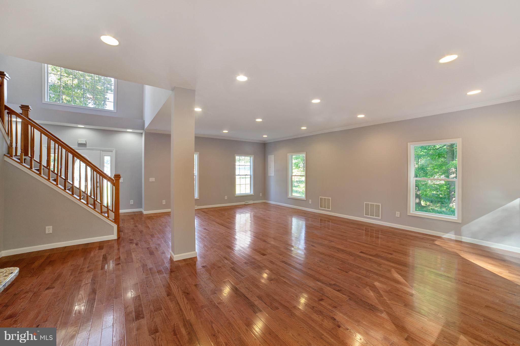 320 W Road Baltimore, MD 21221 - Photo 2 of 30 a view of empty room with wooden floor and fan