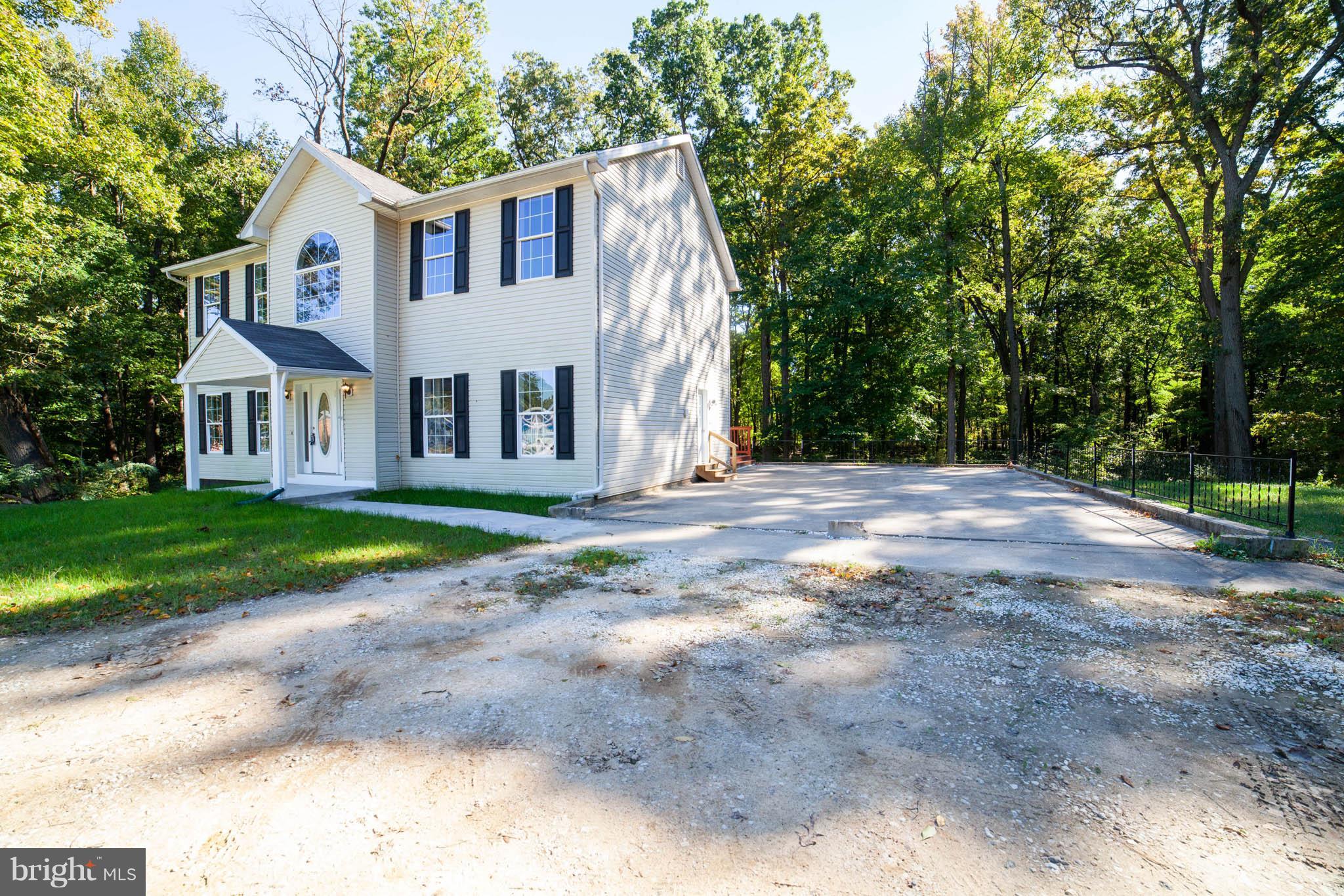 320 W Road Baltimore, MD 21221 - Photo 29 of 30 a front view of a house with a yard
