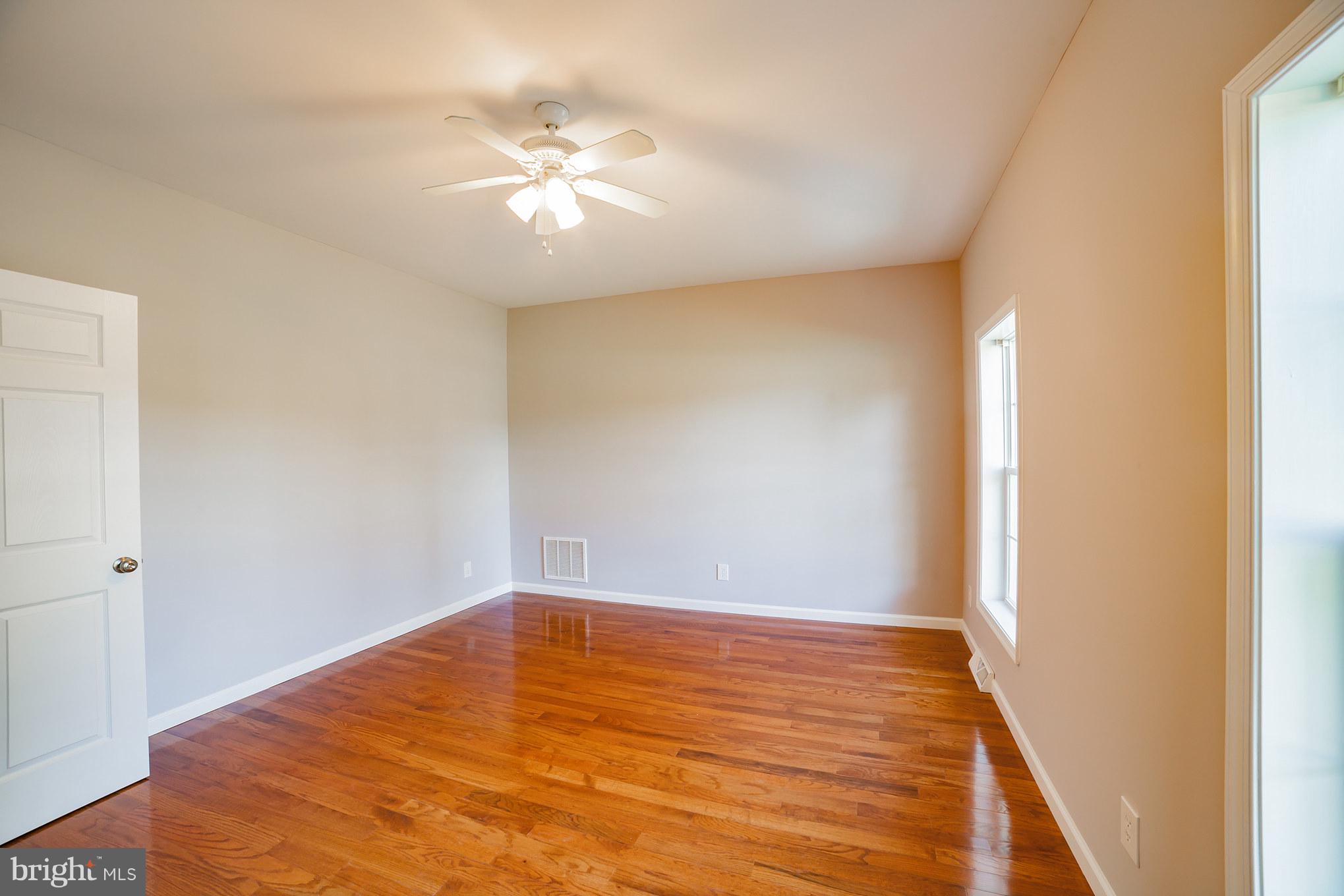 320 W Road Baltimore, MD 21221 - Photo 9 of 30 a view of empty room with wooden floor