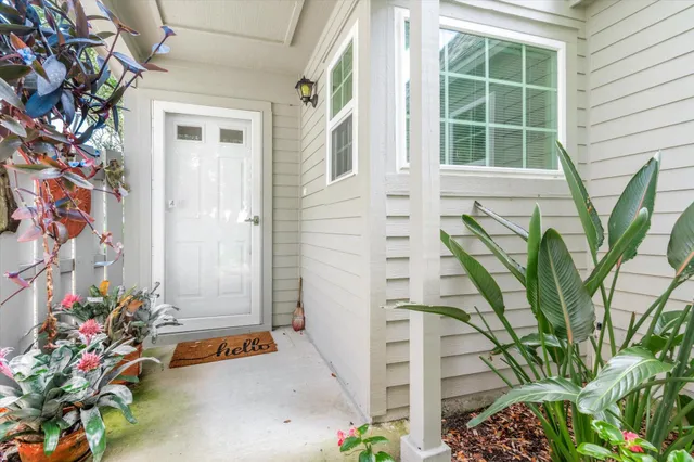an empty room with a fireplace and window