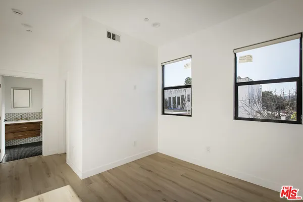 a view of livingroom with furniture and wooden floor