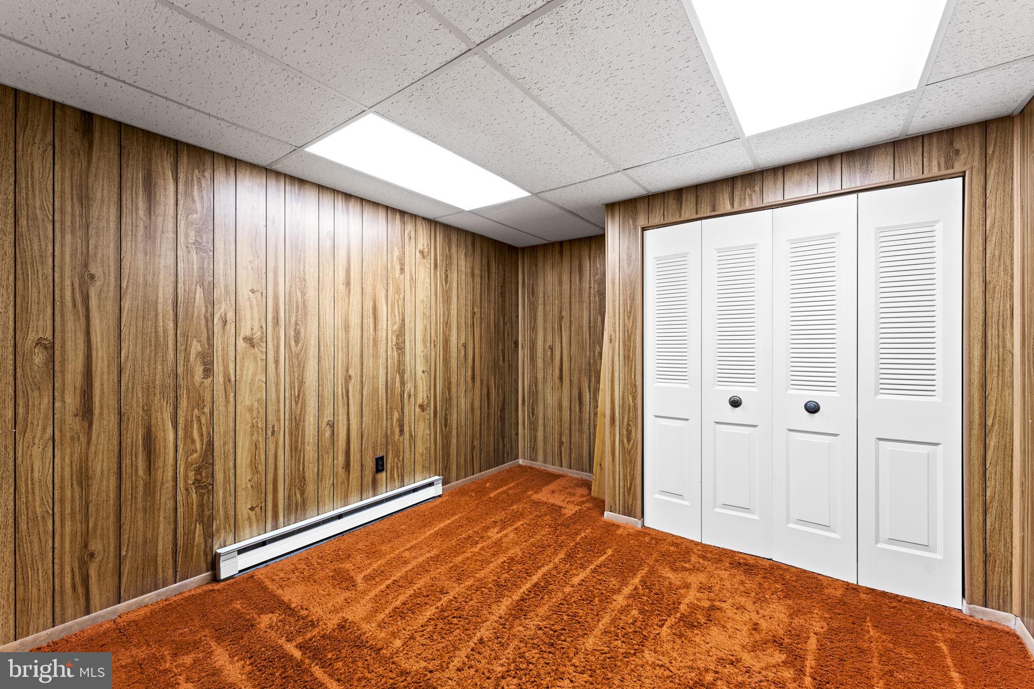 11053 Brent Town Road Catlett, VA 20119 - Photo 55 of 76 Cozy basement retreat with warm tones.