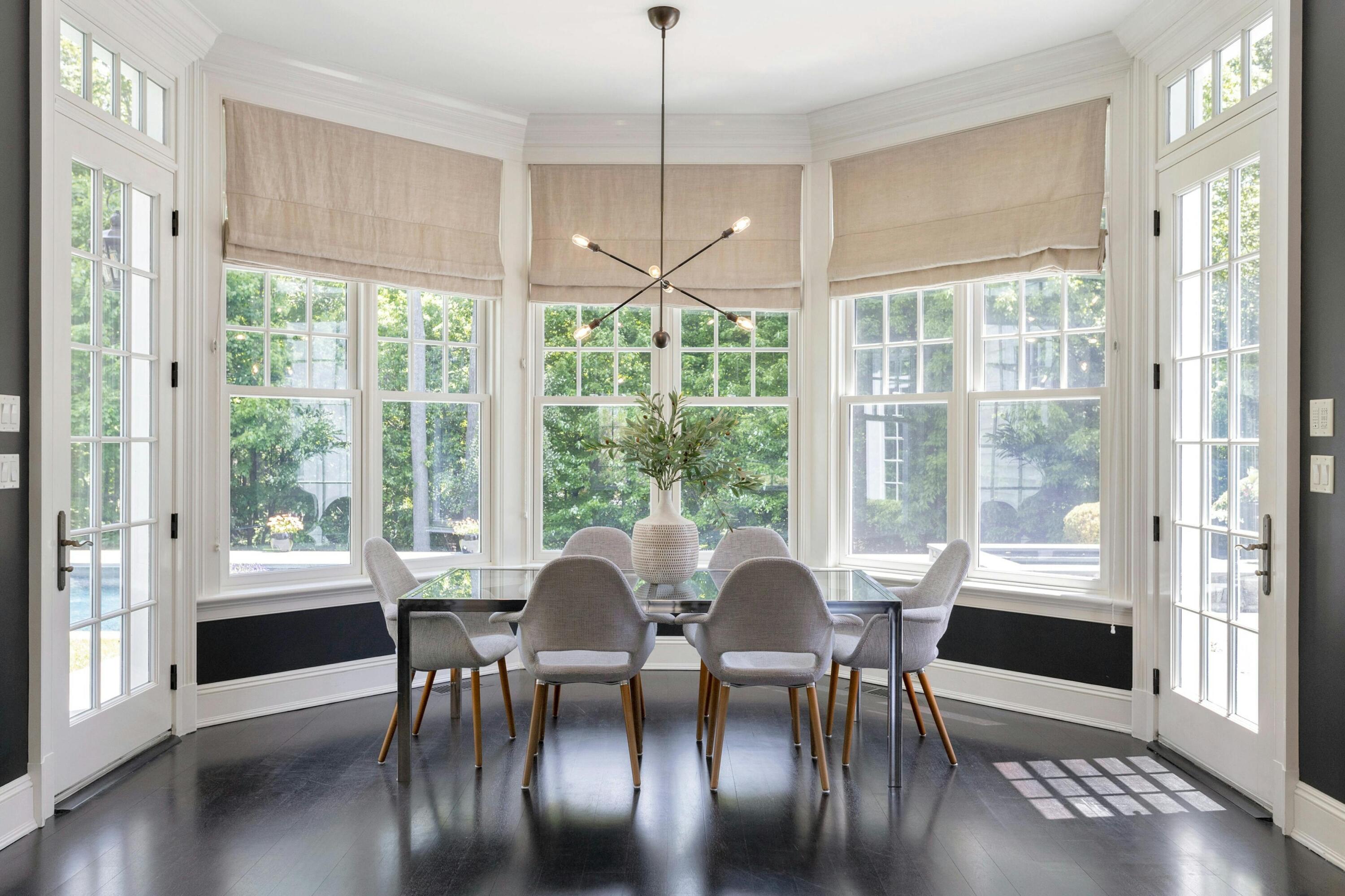 378 Brookside Road Darien, CT 06820 - Photo 13 of 40 a view of a dining room with furniture window and wooden floor