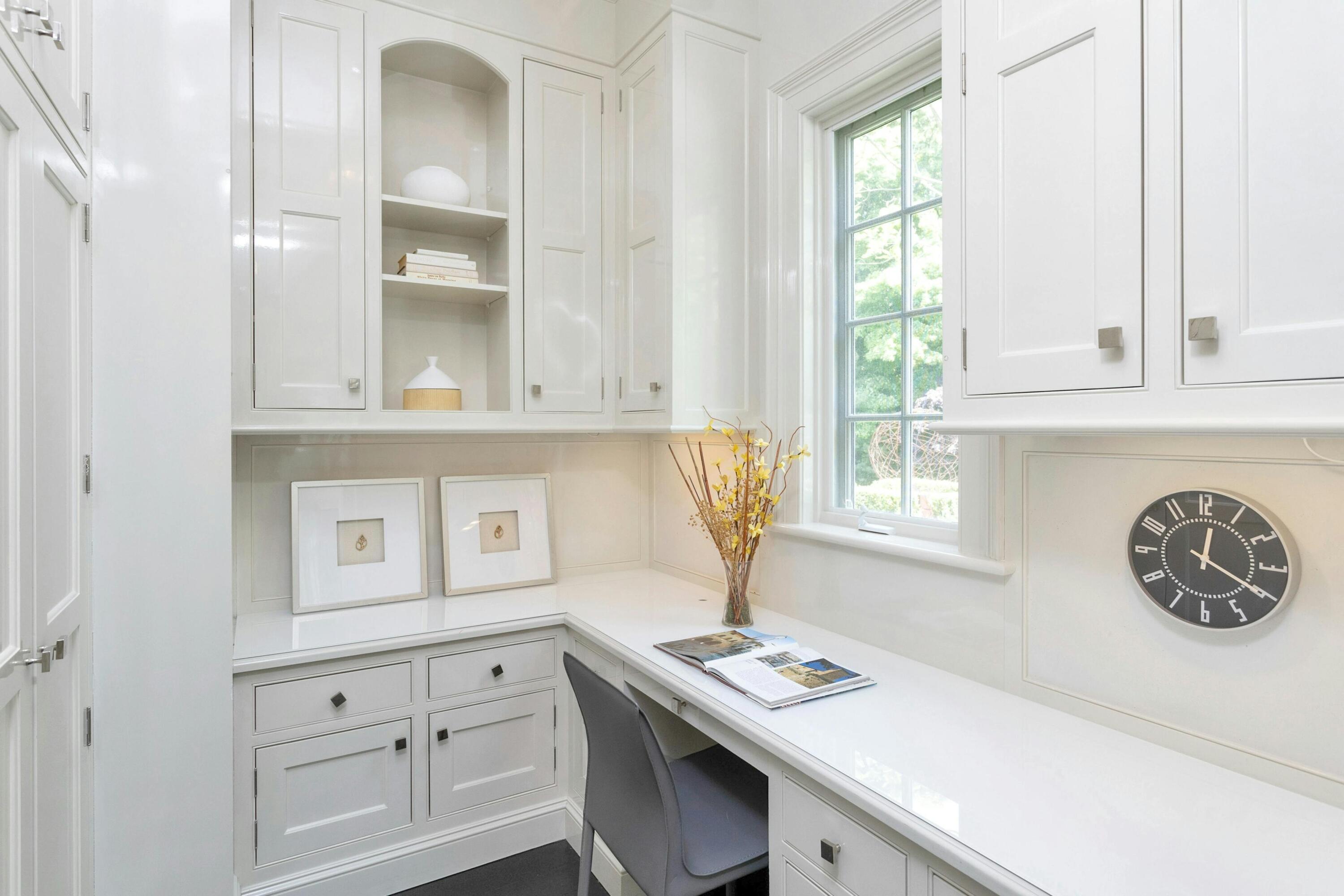 378 Brookside Road Darien, CT 06820 - Photo 14 of 40 a bathroom with a sink cabinets and a window