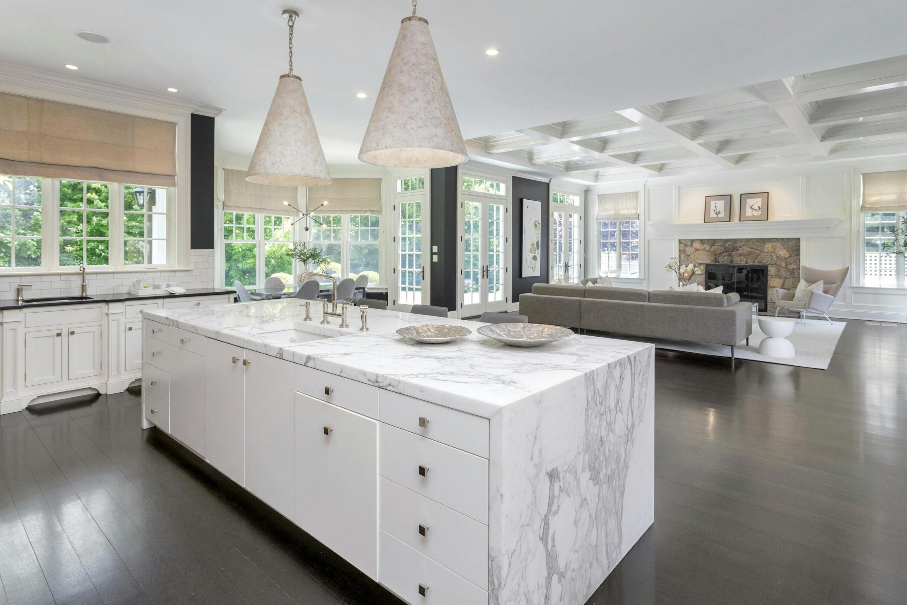 378 Brookside Road Darien, CT 06820 - Photo 15 of 40 a kitchen with sink cabinets and wooden floor