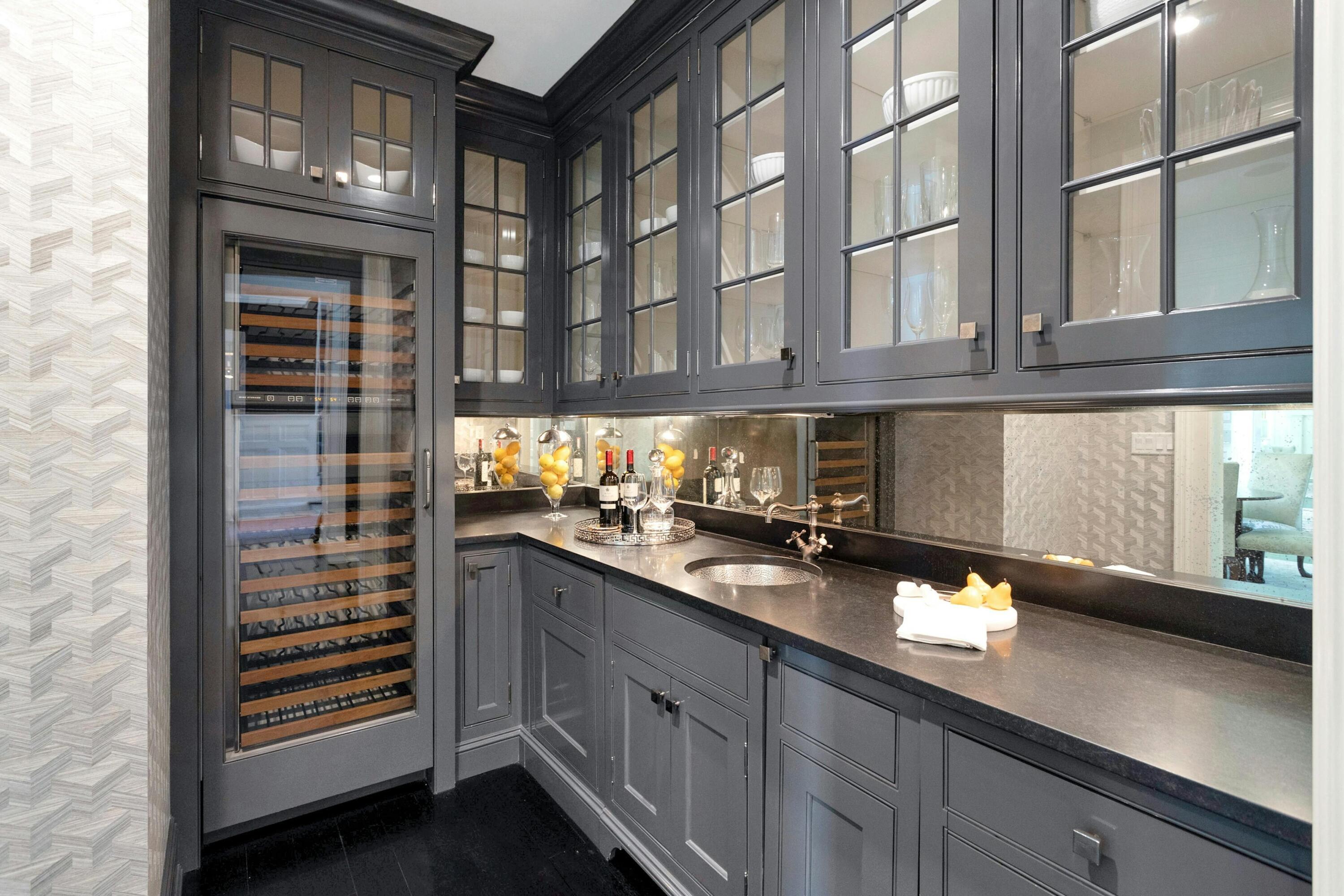 378 Brookside Road Darien, CT 06820 - Photo 18 of 40 a kitchen with stainless steel appliances a sink and cabinets