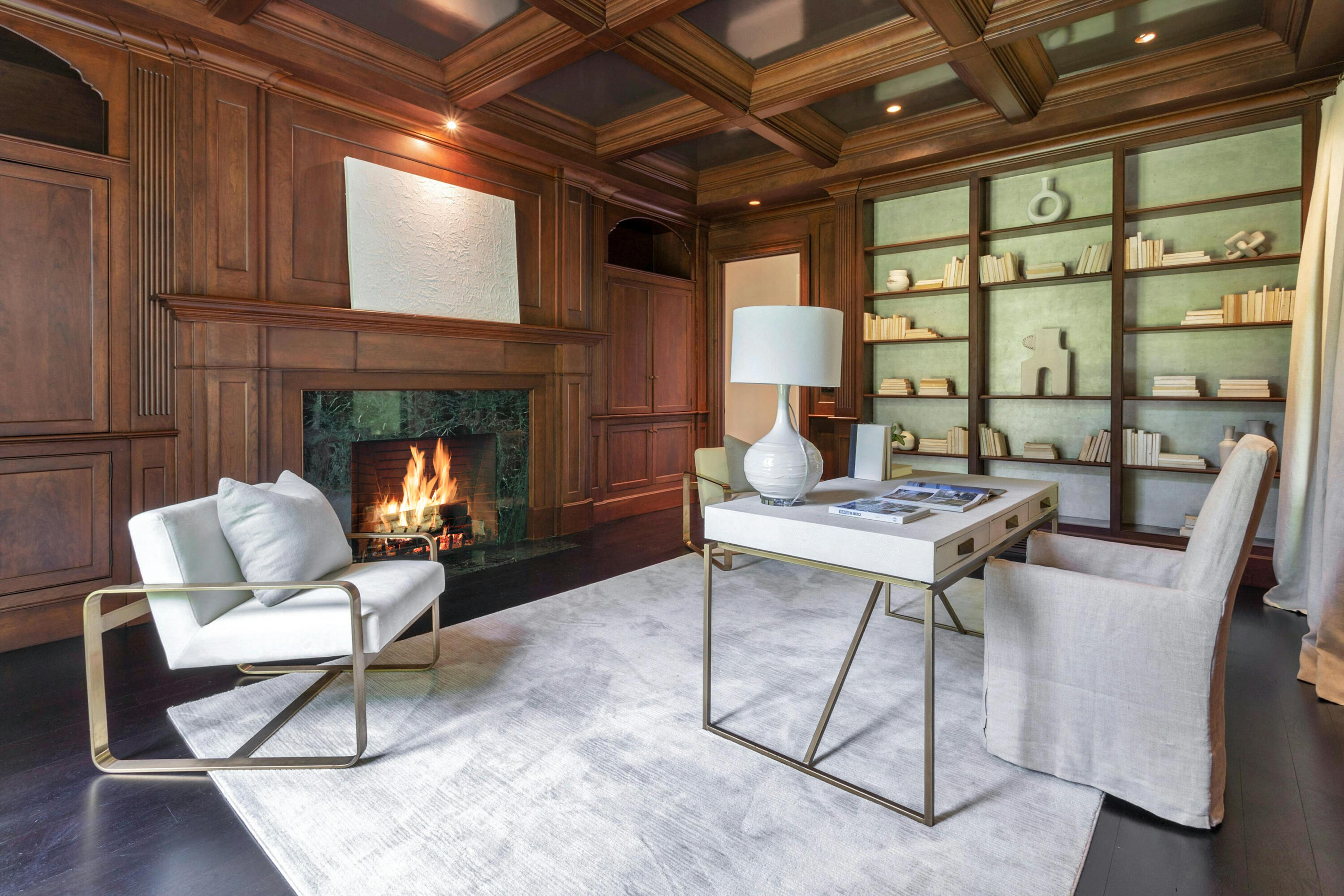 378 Brookside Road Darien, CT 06820 - Photo 19 of 40 a living room with furniture a fireplace and a table