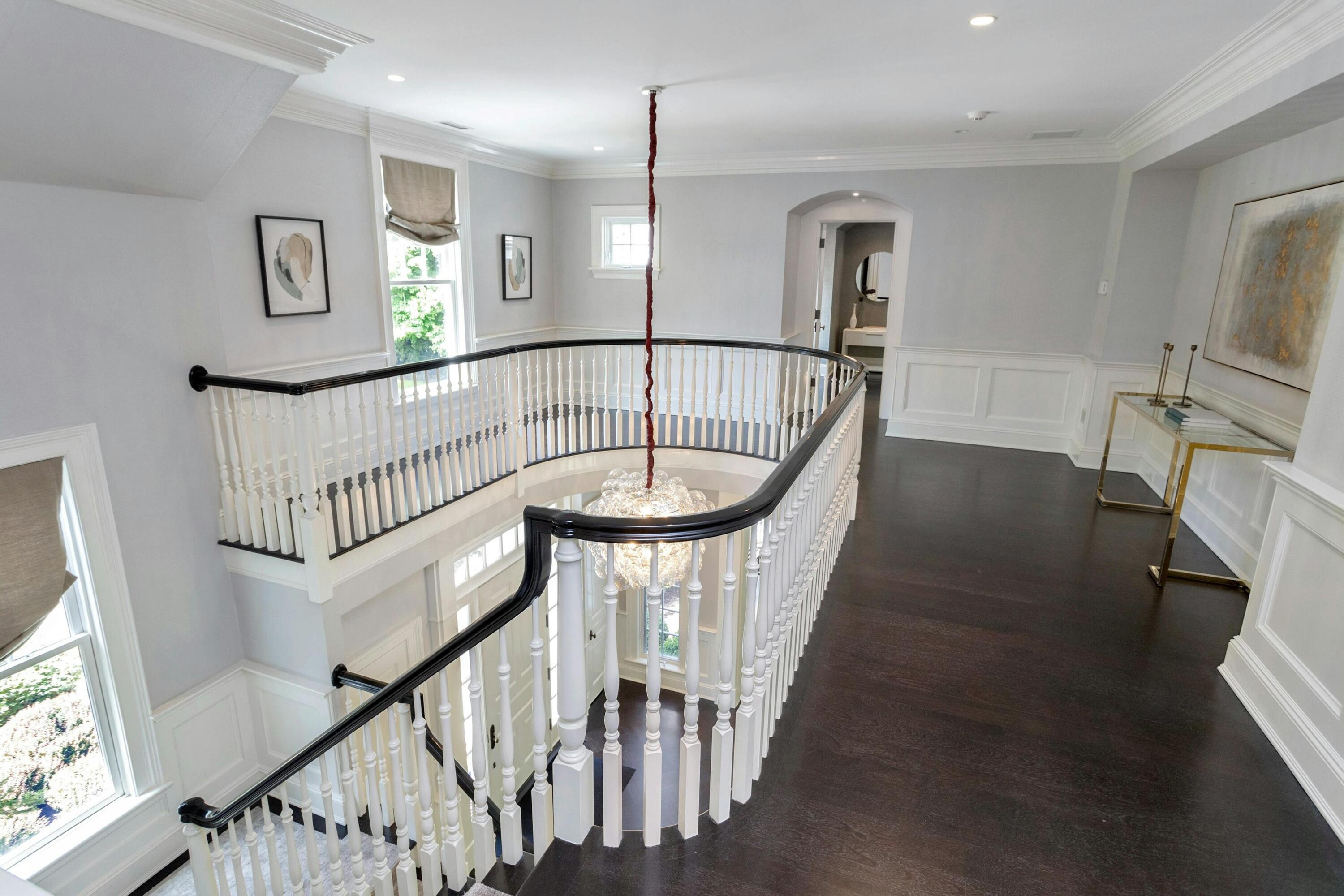 378 Brookside Road Darien, CT 06820 - Photo 22 of 40 a view of entryway with a window and wooden floor
