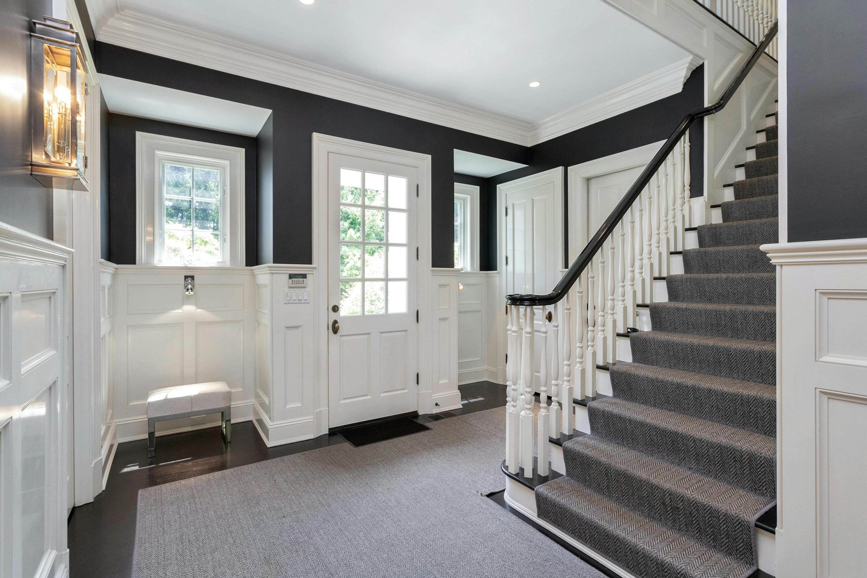 378 Brookside Road Darien, CT 06820 - Photo 35 of 40 a view of an entryway with wooden floor and stairs
