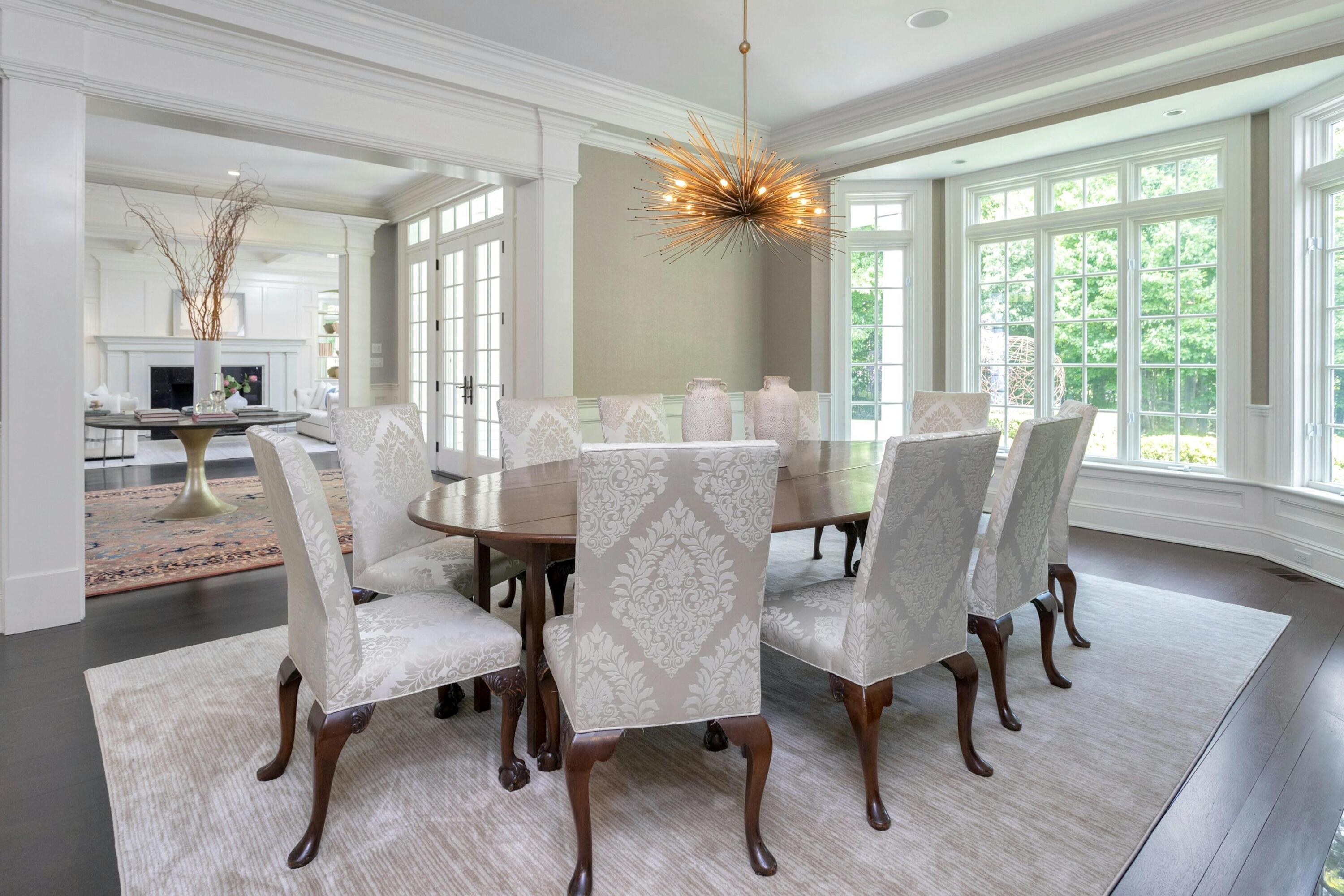 378 Brookside Road Darien, CT 06820 - Photo 8 of 40 a view of a dining room with furniture window and wooden floor