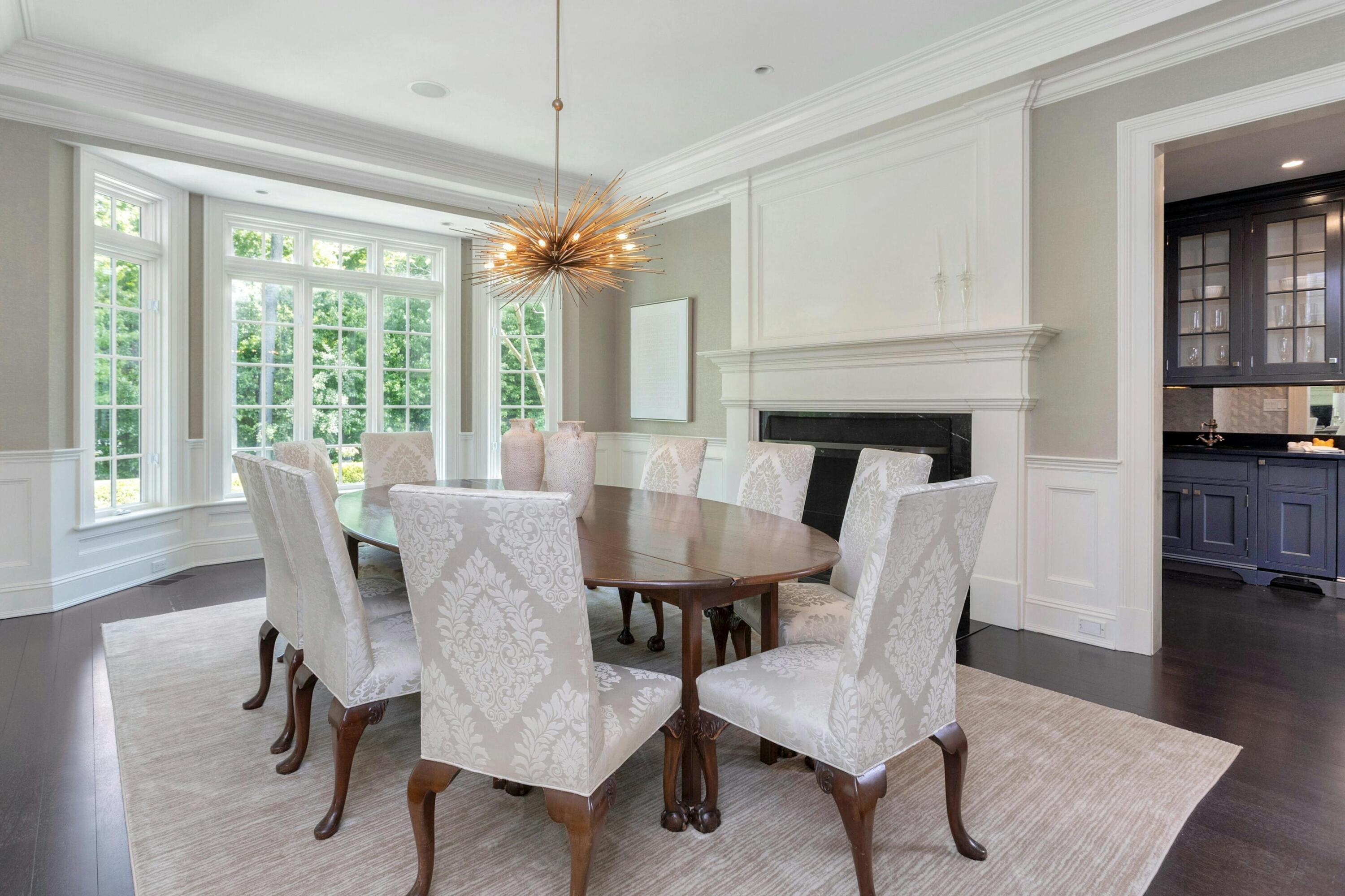 378 Brookside Road Darien, CT 06820 - Photo 9 of 40 a view of a dining room with furniture window and wooden floor