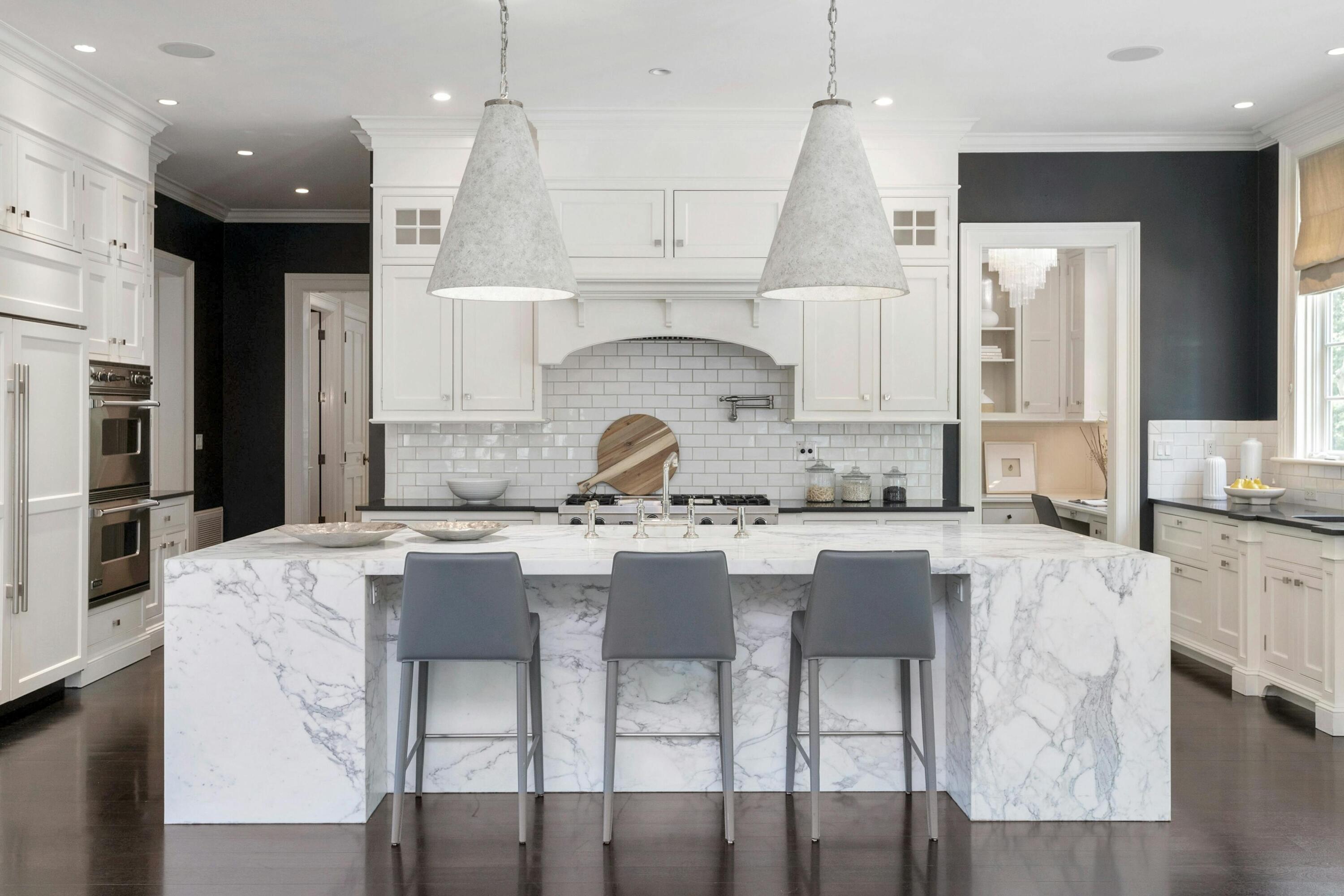 378 Brookside Road Darien, CT 06820 - Photo 10 of 40 a kitchen with granite countertop a sink and white cabinets