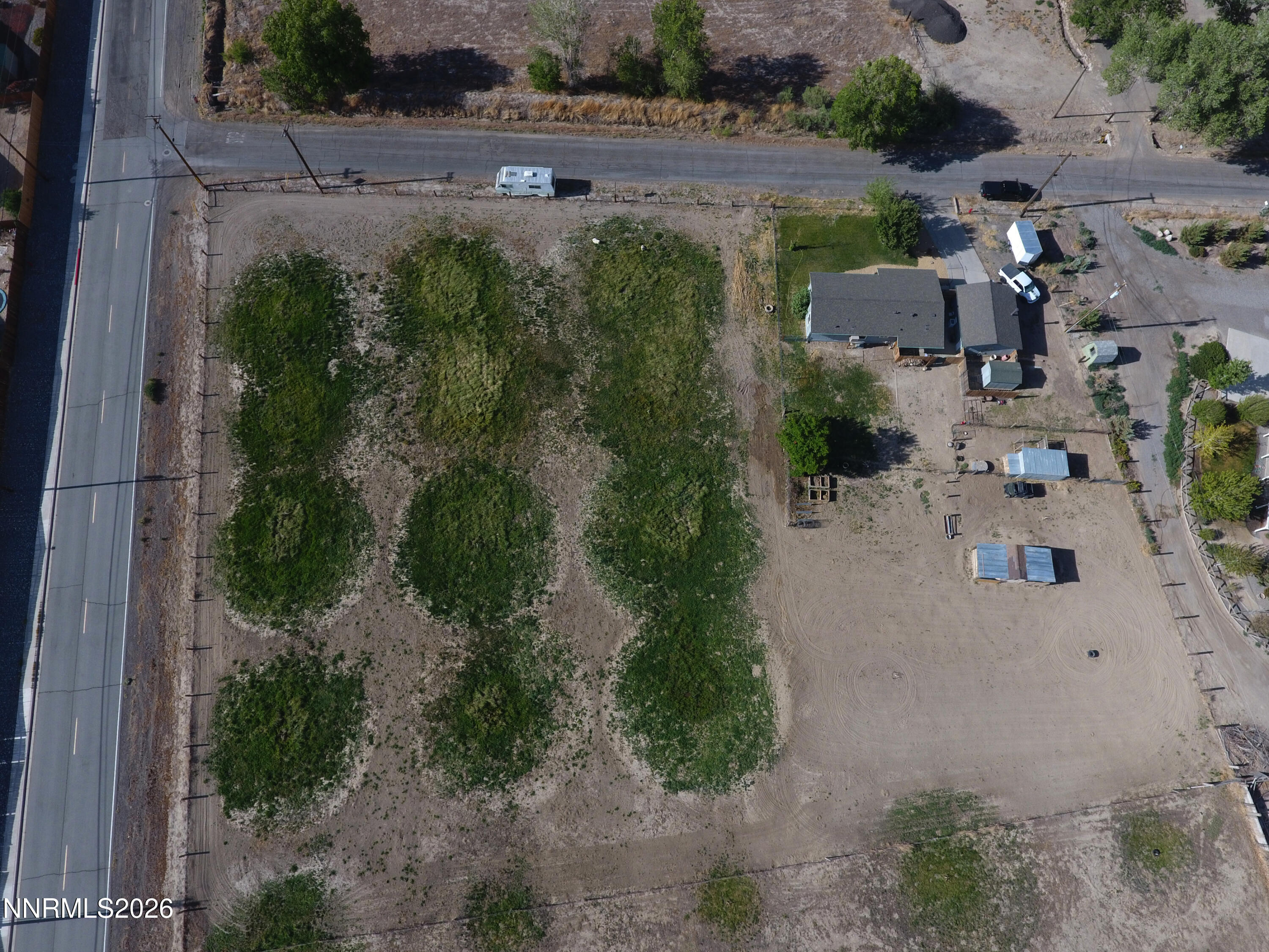 1125 Rancho Road Fernley, NV 89408 - Photo 46 of 47 an aerial view of multiple houses with outdoor space