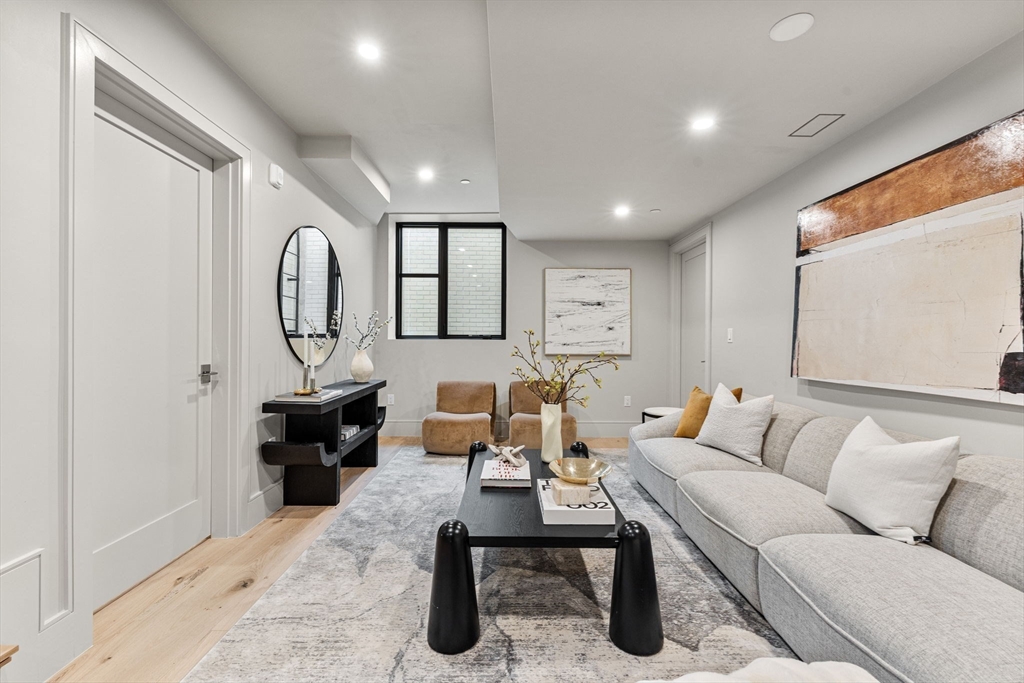 300 Franklin Street, Unit 1 Cambridge, MA 02139 - Photo 21 of 38 a living room with furniture