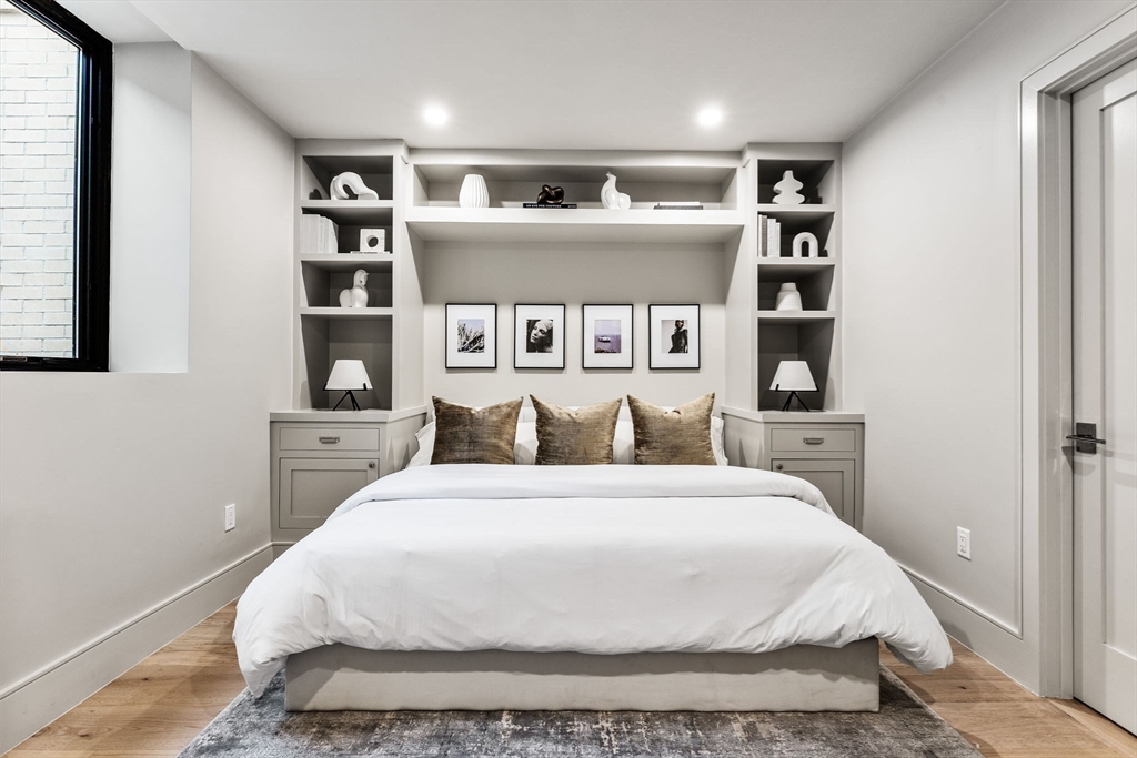 300 Franklin Street, Unit 1 Cambridge, MA 02139 - Photo 25 of 38 a large white bed in a white room