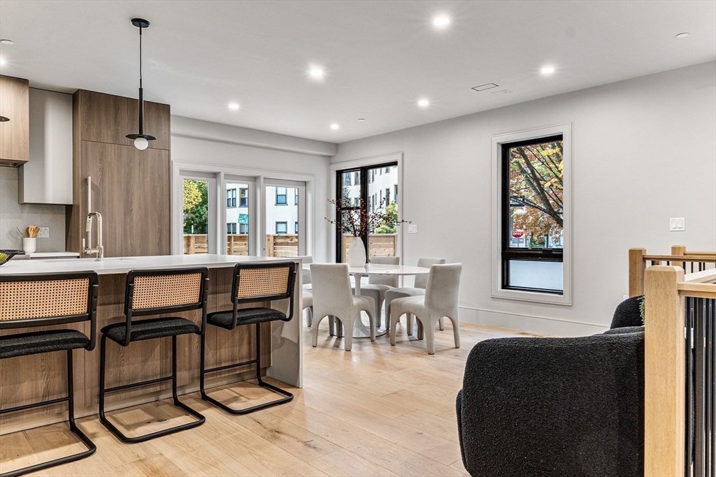 300 Franklin Street, Unit 1 Cambridge, MA 02139 - Photo 3 of 38 a dining room with furniture and window