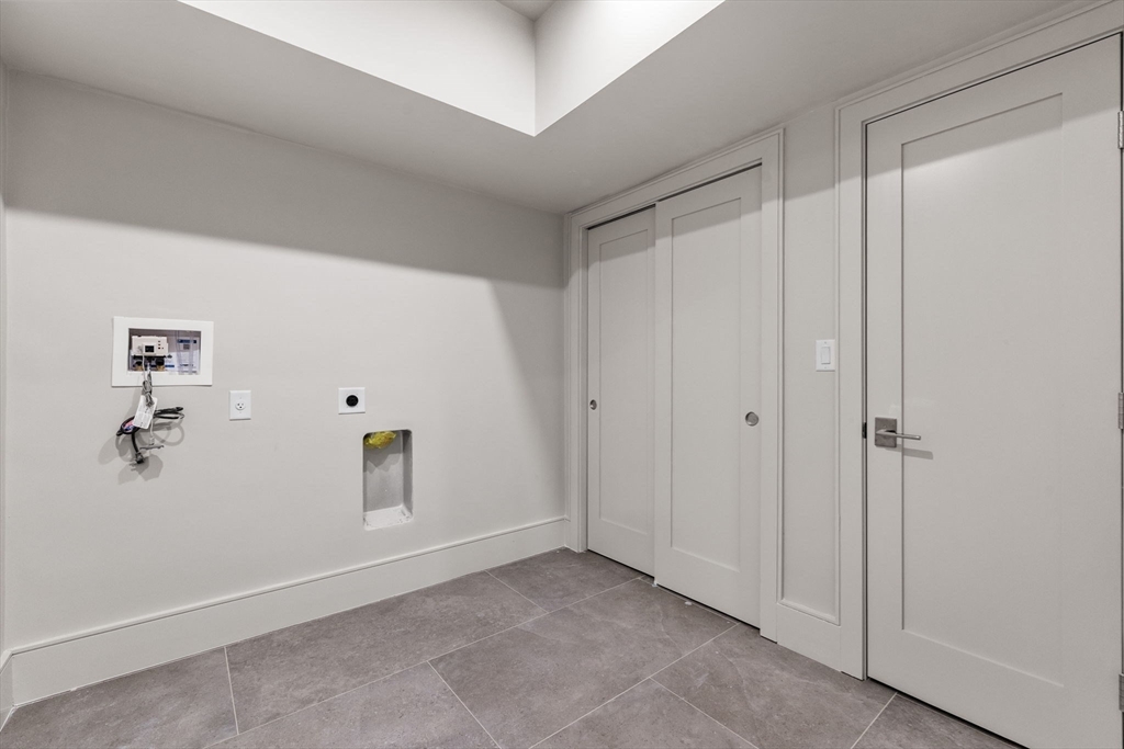 300 Franklin Street, Unit 1 Cambridge, MA 02139 - Photo 31 of 38 a view of a closet area with ceiling fan