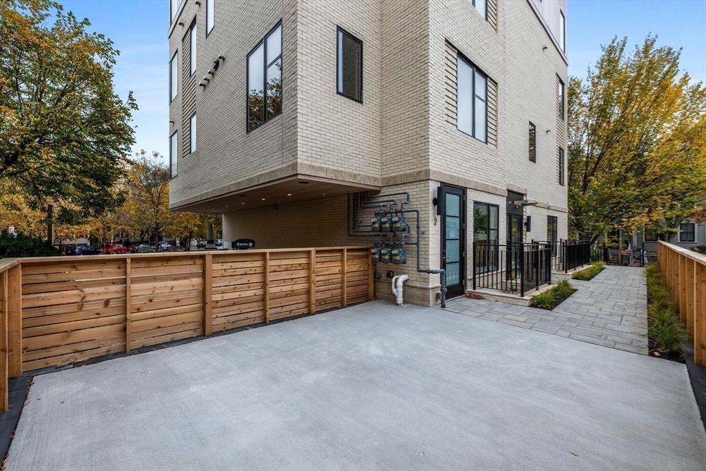 300 Franklin Street, Unit 1 Cambridge, MA 02139 - Photo 36 of 38 a view of a house with a garage