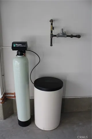 a view of a chairs and table in a patio