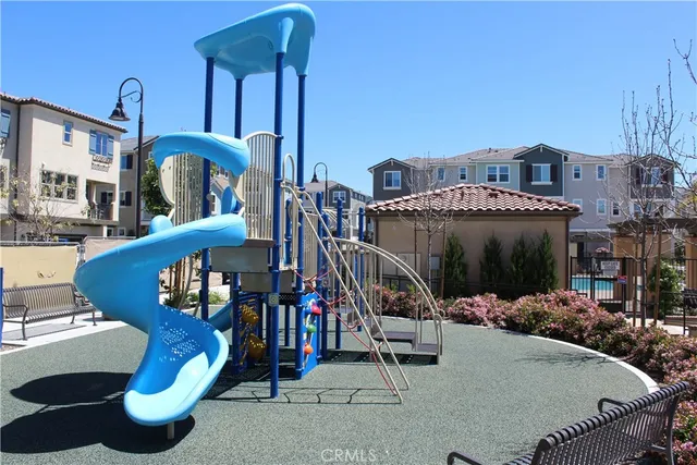 a view of a building with sitting area