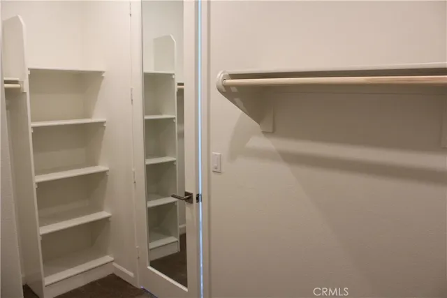 a close view of a refrigerator and cabinets