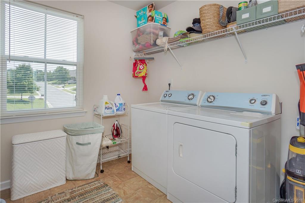 7550 West Berkeley Road, Unit 22 Denver, NC 28037 - Photo 15 of 20 a utility room with dryer and washer