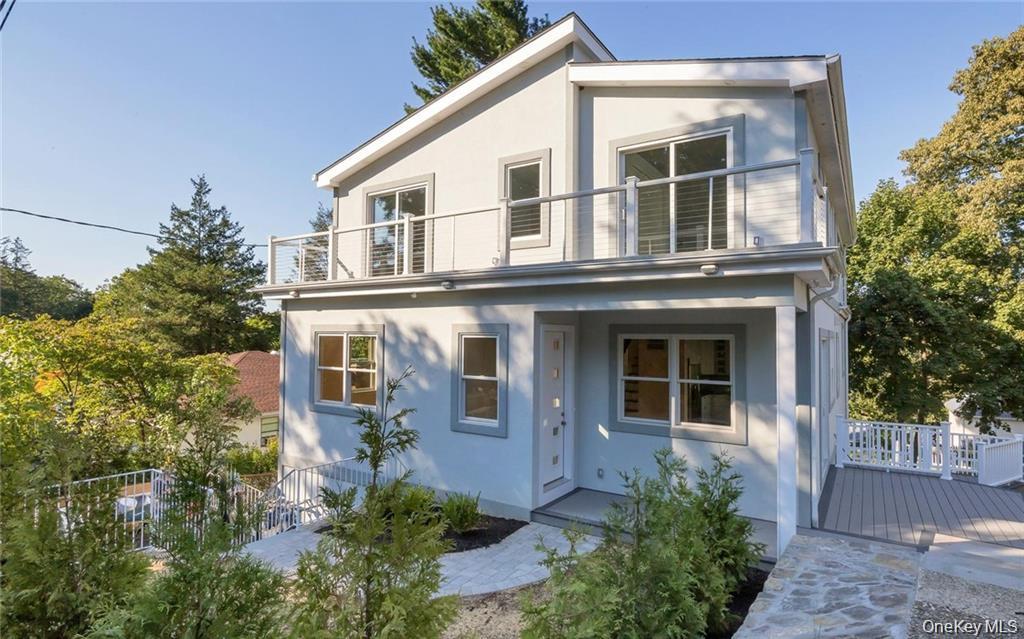 a view of a house with windows and yard