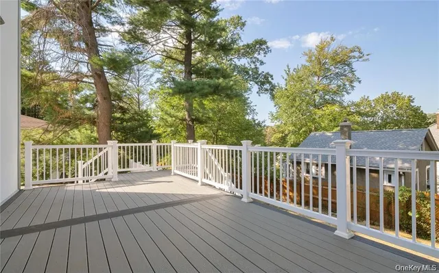 a bathroom with a sink a mirror and shower