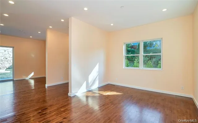 a kitchen with stainless steel appliances a refrigerator sink and cabinets