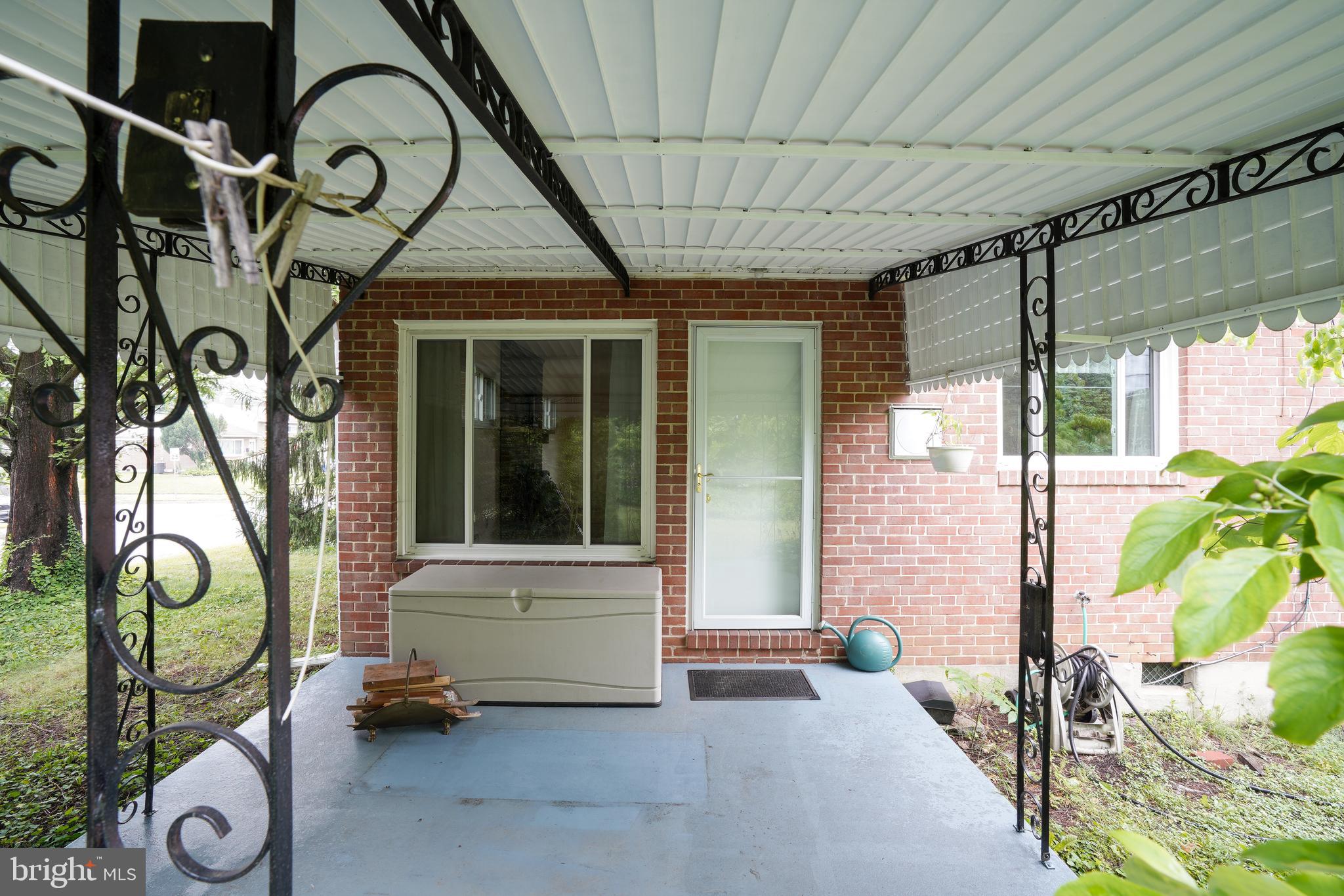 1073 Southridge Road Baltimore, MD 21228 - Photo 23 of 27 a front view of a house with garden
