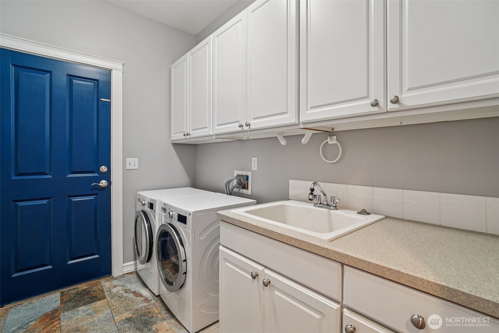 2617 Fir Crest Boulevard Anacortes, WA 98221 - Photo 13 of 31 a utility room with dryer and washer