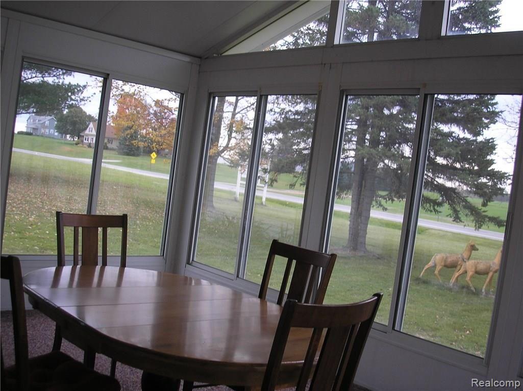 6285 Sanilac Road Kingston, MI 48741 - Photo 4 of 9 Three season room off the dining area.