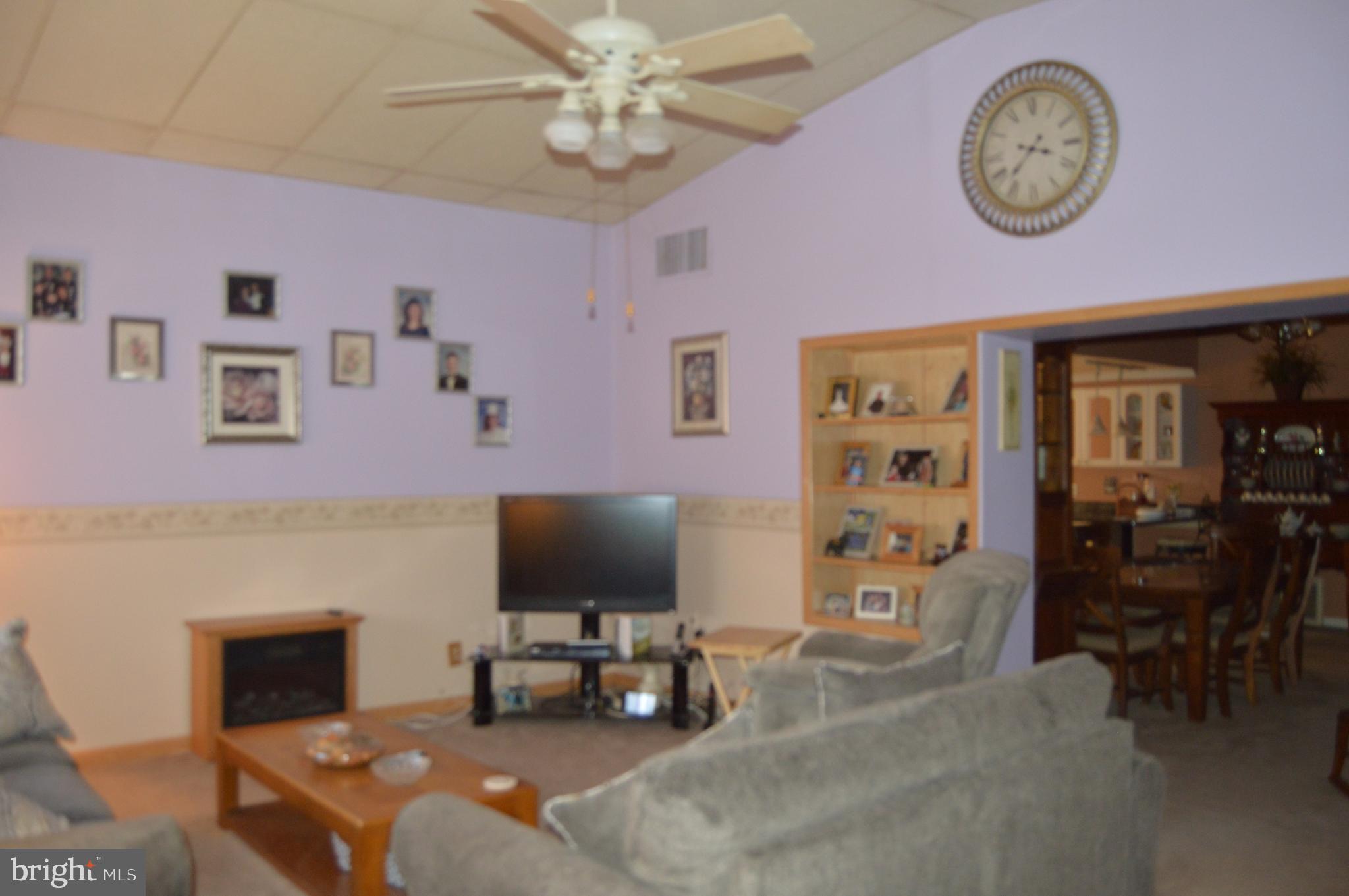 830 Swift Road Pasadena, MD 21122 - Photo 3 of 37 Large living room cathedral ceiling, ceiling fan