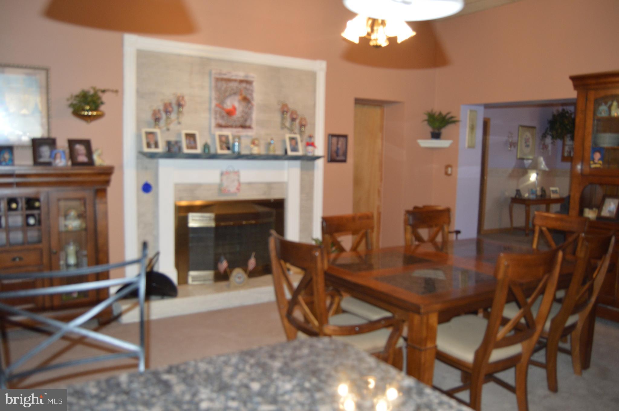 830 Swift Road Pasadena, MD 21122 - Photo 6 of 37 Dining Room w/Fireplace Door to In-Law